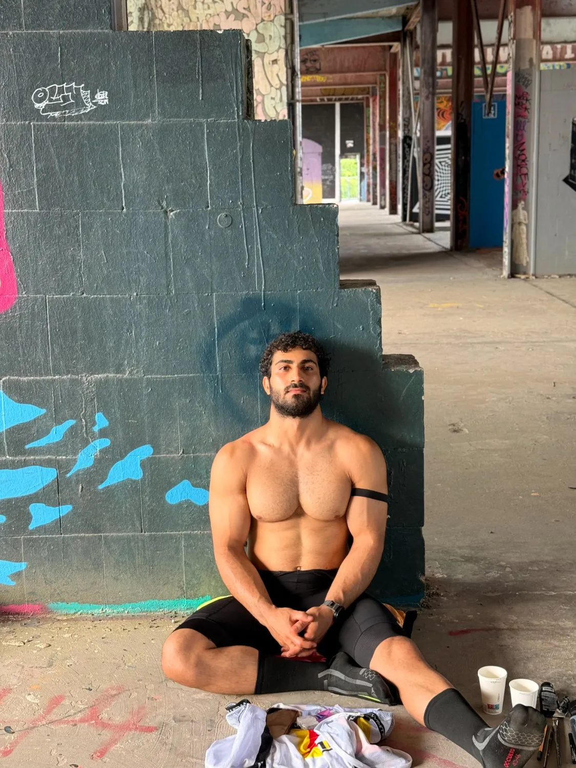 Training shot in front of graffiti.